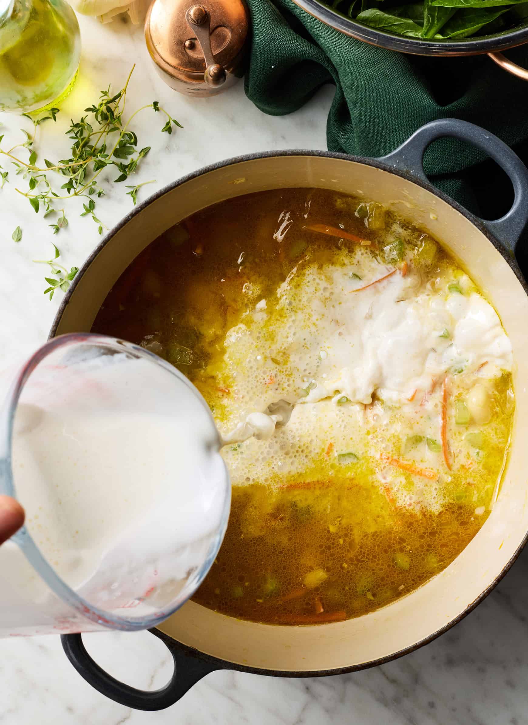 Adding half-and-half to pot