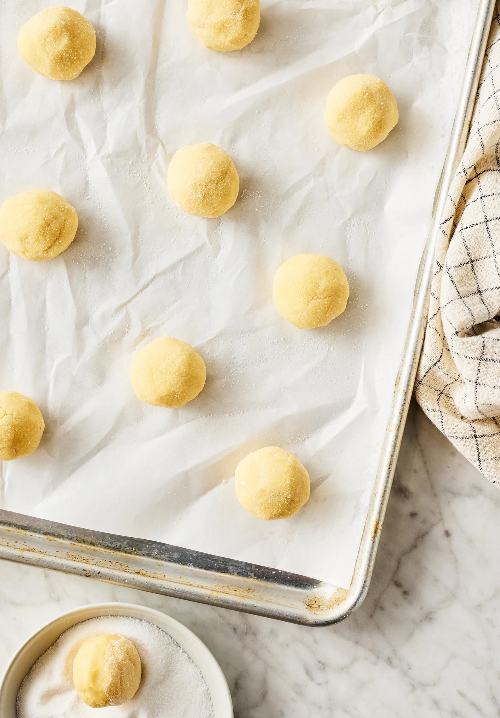 Dough balls on baking sheet
