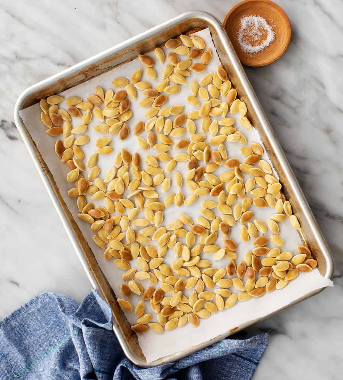 Squash seeds on a baking sheet