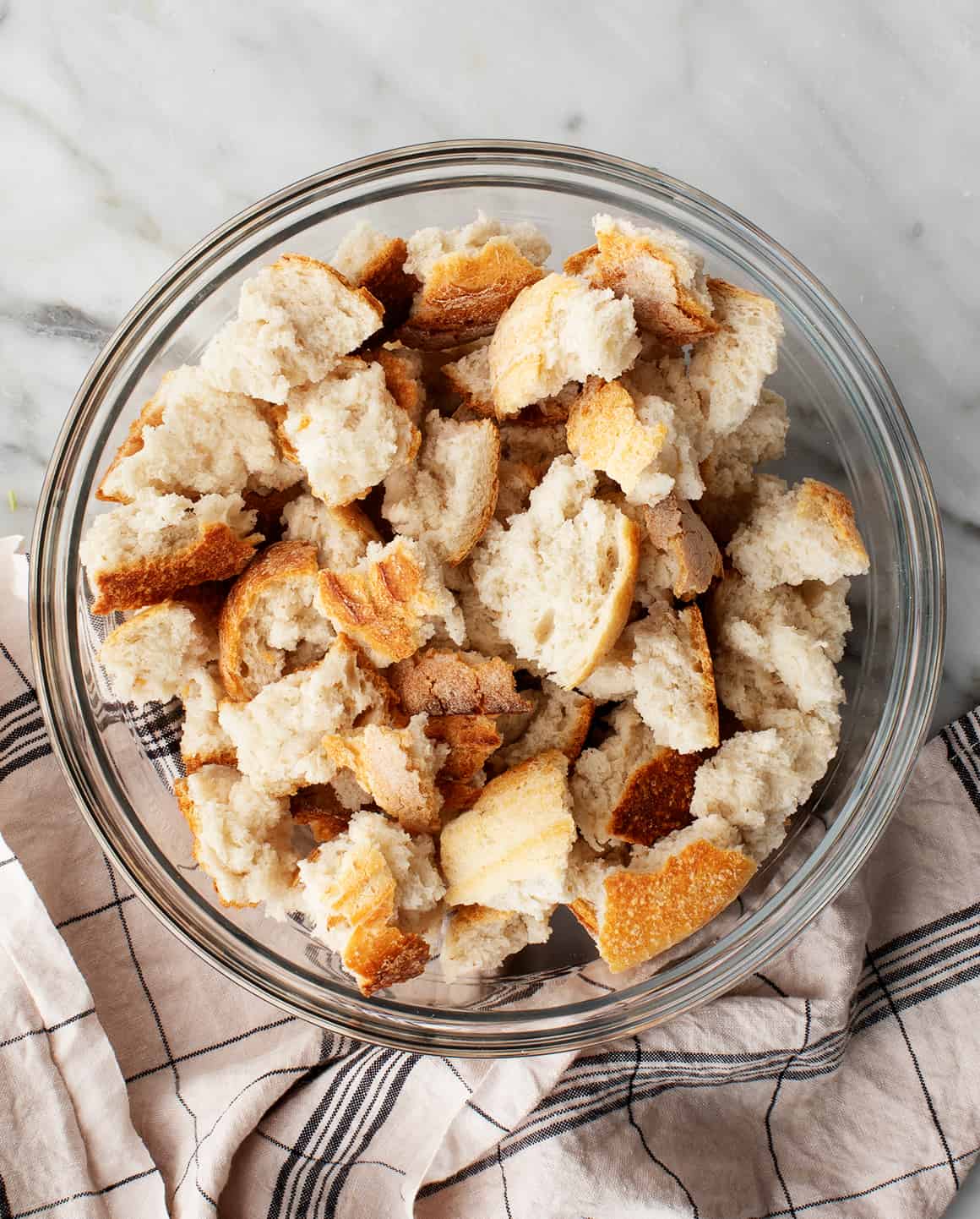 Dried bread cubes in a mixing bowl