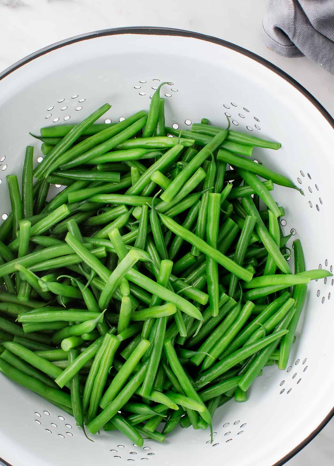 Fresh green beans in a colander