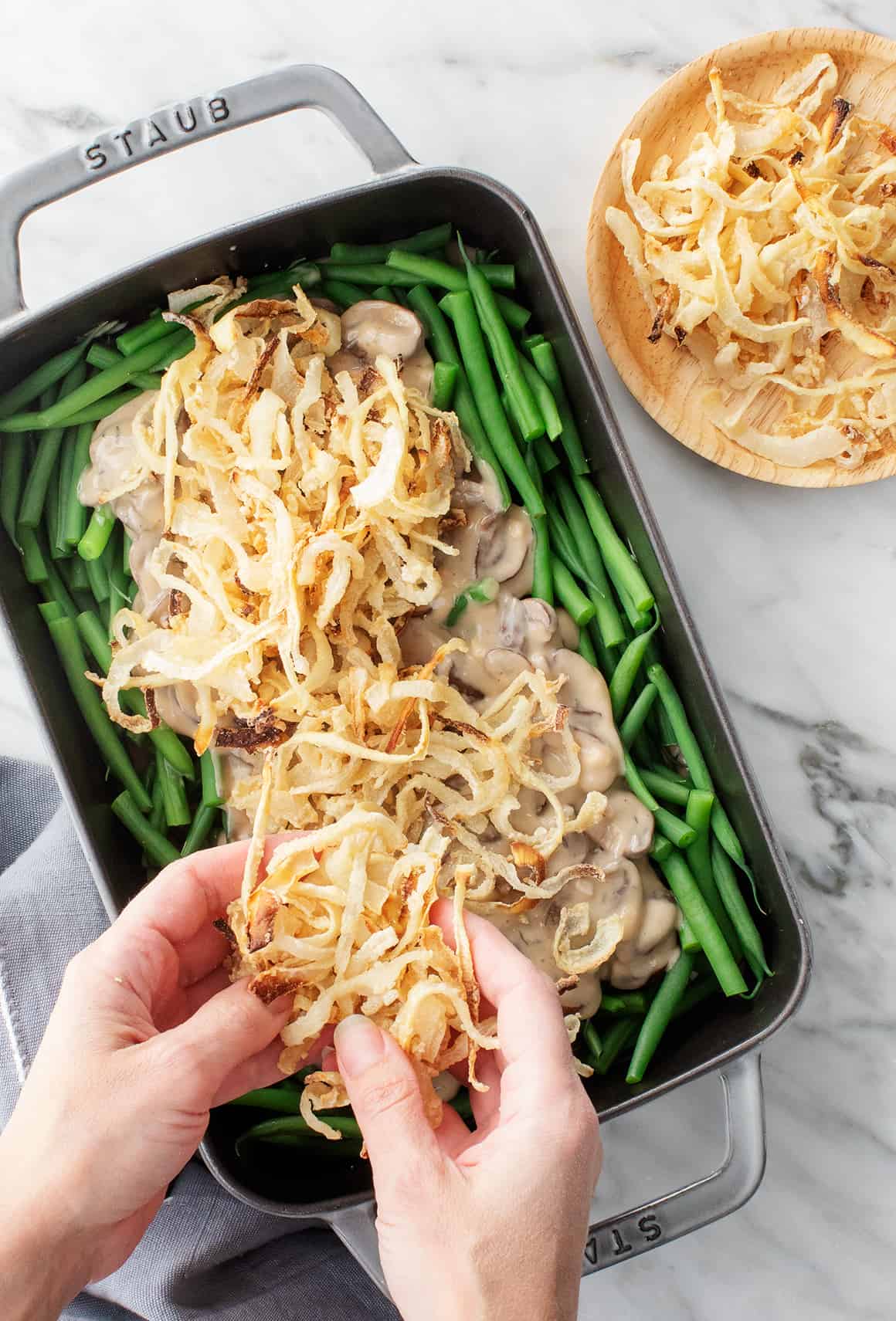 How to make green bean casserole - adding crispy onion topping