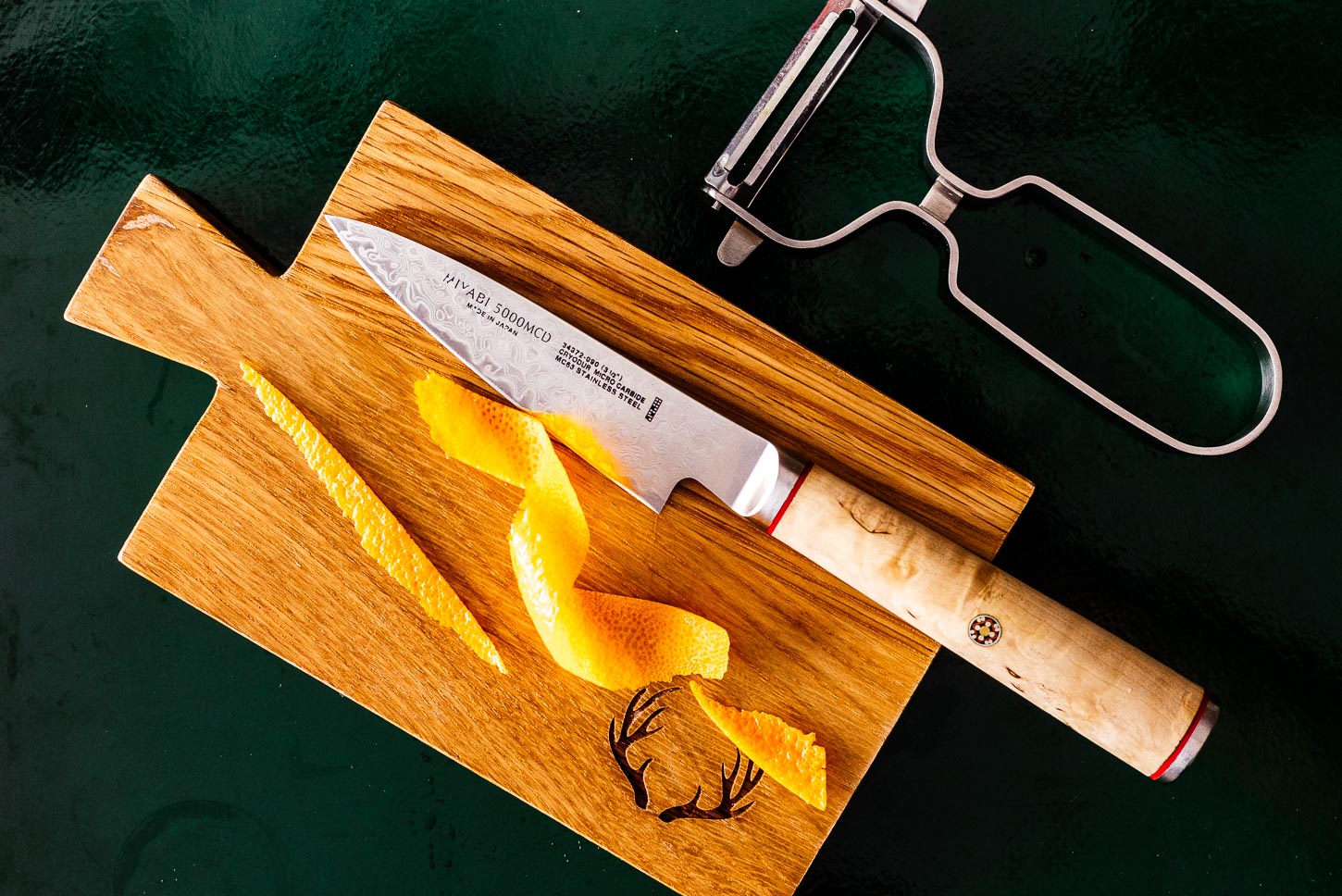 trimming orange peel garnish | www.iamafoodblog.com