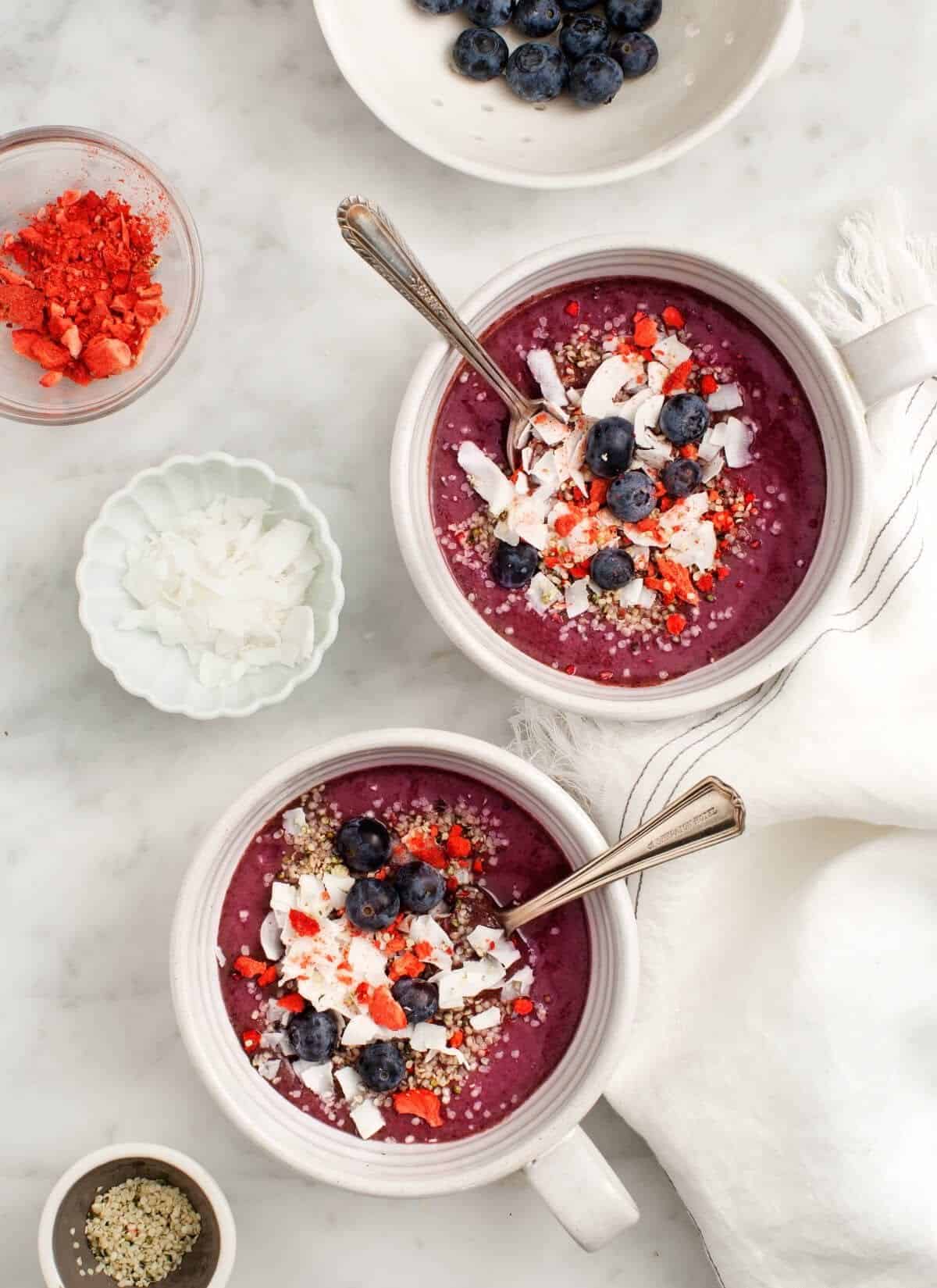 Healthy berry superfood smoothie bowls
